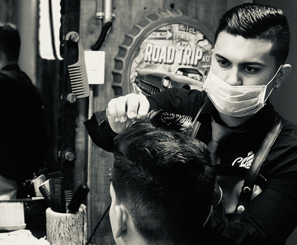 CHARLIES BARBER SHOP .